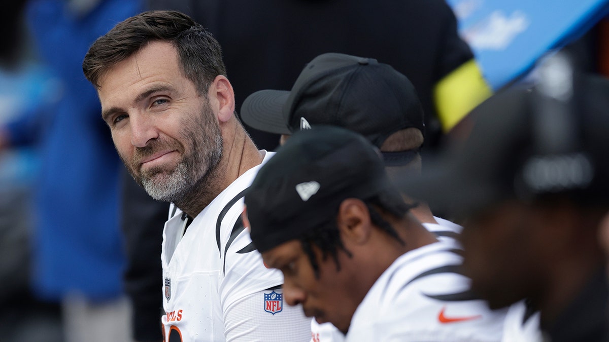 Joe Flacco smirks on the bench