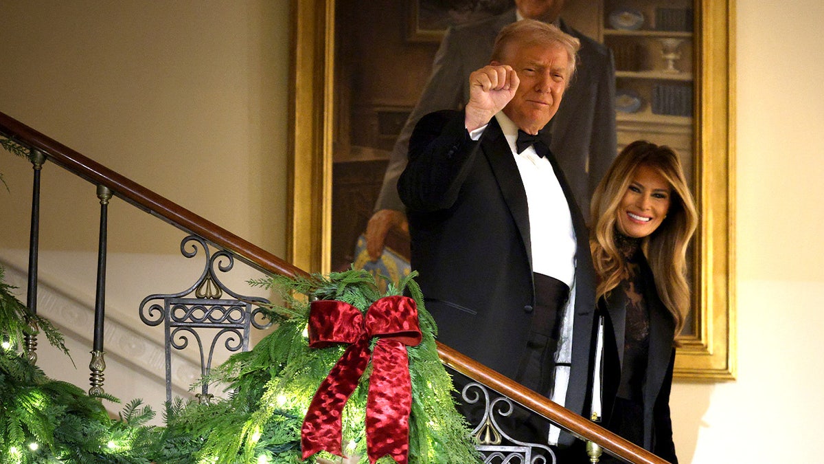 First lady Melania Trump and President Trump arriving to Christmas party.