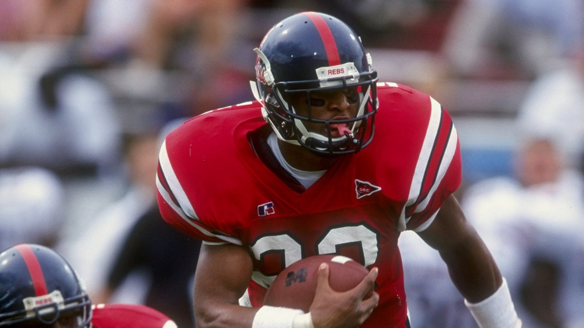 Deuce McAllister runs on field