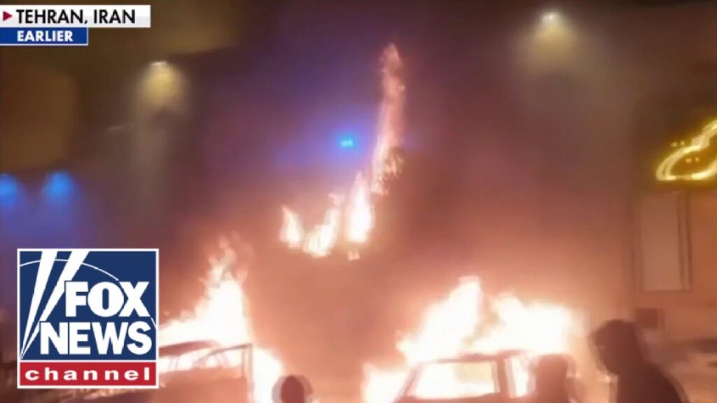 Protesters set Tehran ABLAZE