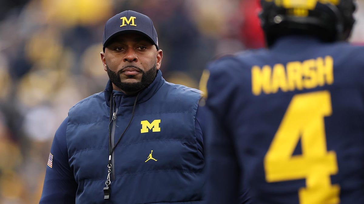 Sherrone Moore during warmups before a game against the Ohio State Buckeyes at Michigan Stadium Nov. 29, 2025, in Ann Arbor, Mich.