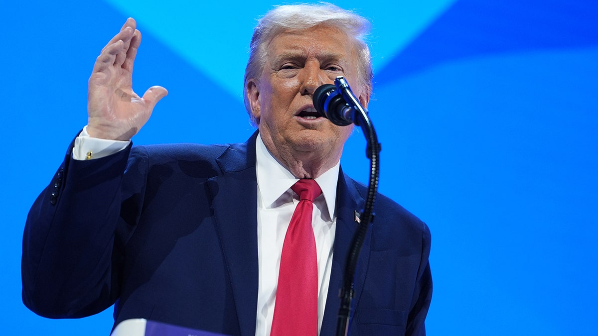 President Donald Trump speaks while addressing an audience at the World Economic Forum.