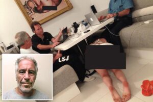 Disturbing photo shows Epstein and pals sitting unfazed as bikini woman crawls under table with picture of naked baby nearby