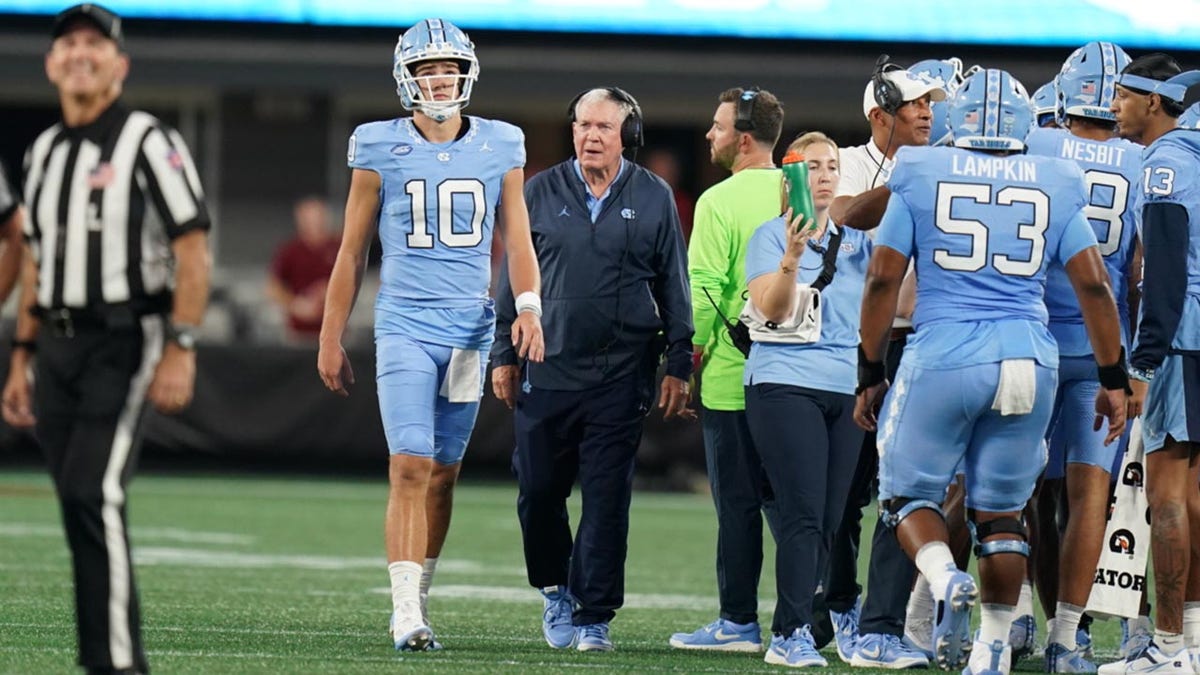 Drake Maye and Mack Brown