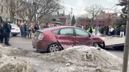 Minnesota police say vehicle believed to be pursued by federal agents crashed downtown, protests ensue
