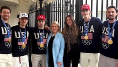 Karoline Leavitt's White House photo with Team USA hockey stars ignites online fury over MAGA hat