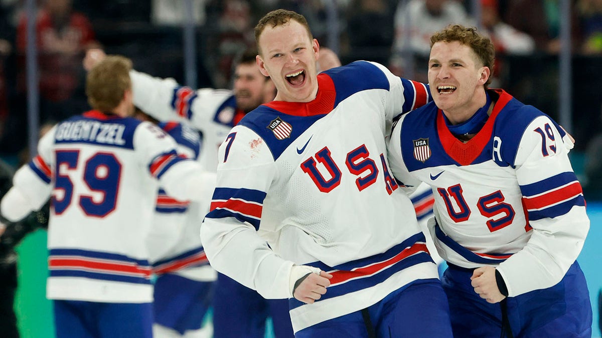 Brady and Matthew Tkachuk celebrate the gold medal win