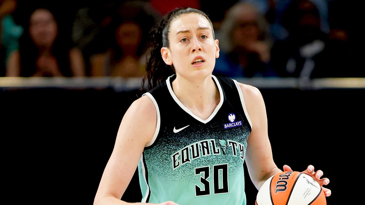 Breanna Stewart looks on court