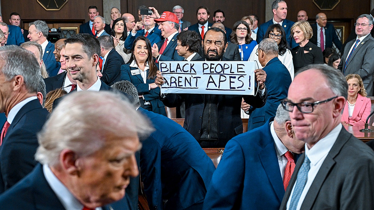 Green with sign at SOTU