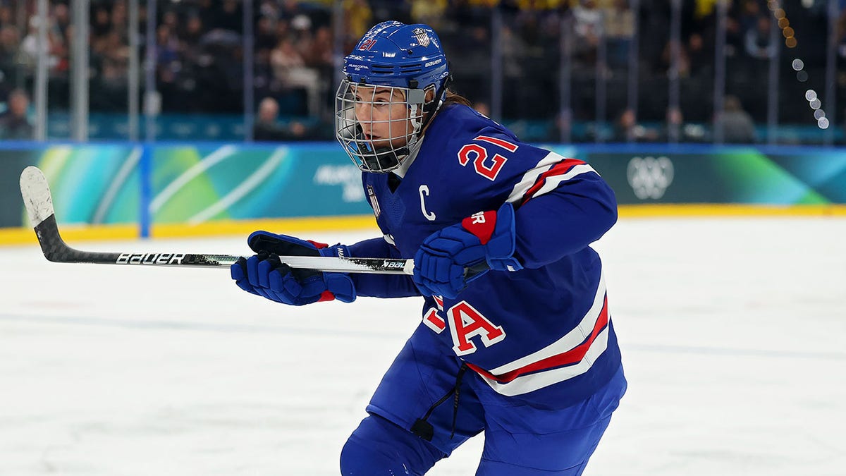 Hilary Knight skates on ice