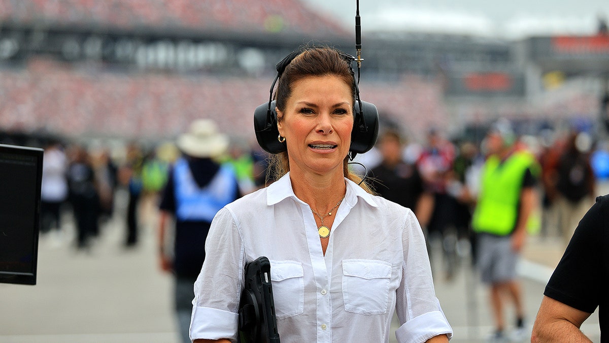 Jamie Little looks on