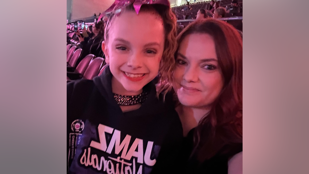 Close up of Addi Smith, 11, and her mother, Tawnia McGeehan, 38