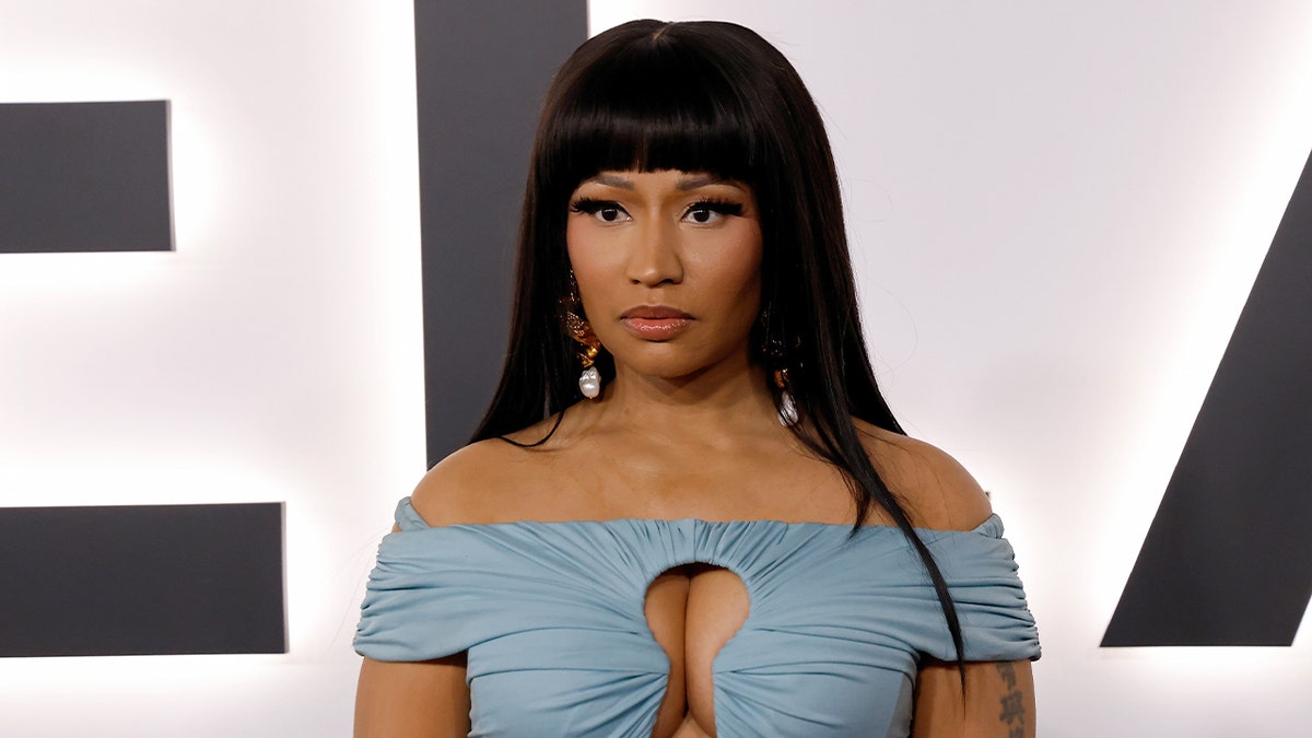 Nicki Minaj poses on the red carpet at a film premiere event in Washington.