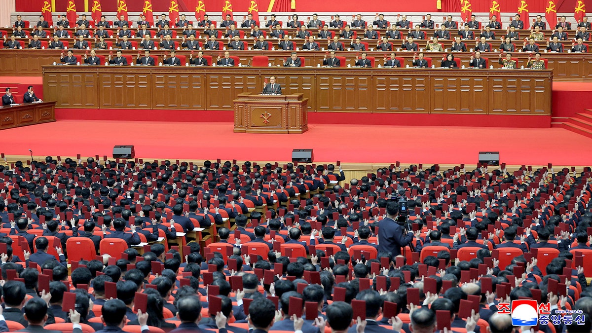 Kim Jong Un sits at a podium during a Workers’ Party congress in Pyongyang.