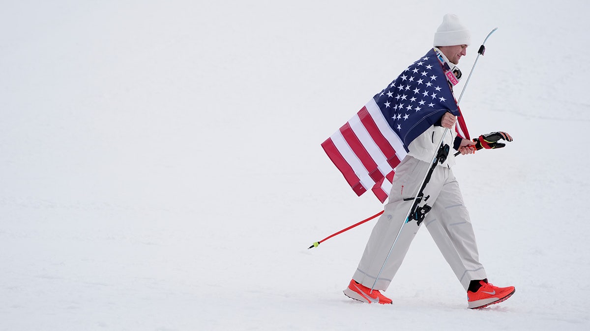 Ryan Cochran-Siegle has the American flag over his shoulder