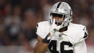 Falcons dismiss assistant coach LaTroy Lewis amid police probe into Michigan-linked allegations