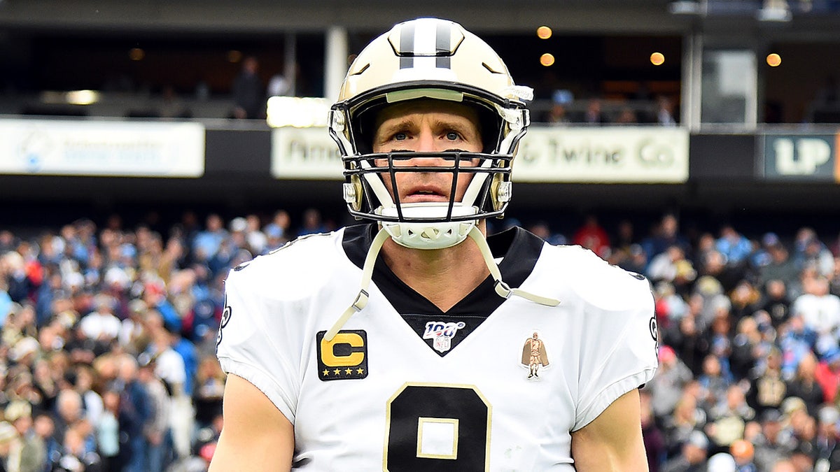 Drew Brees looks on