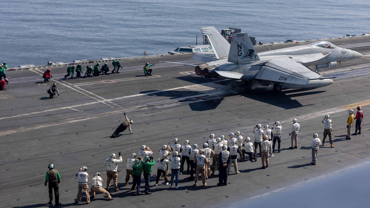Plane on an aircraft carrier