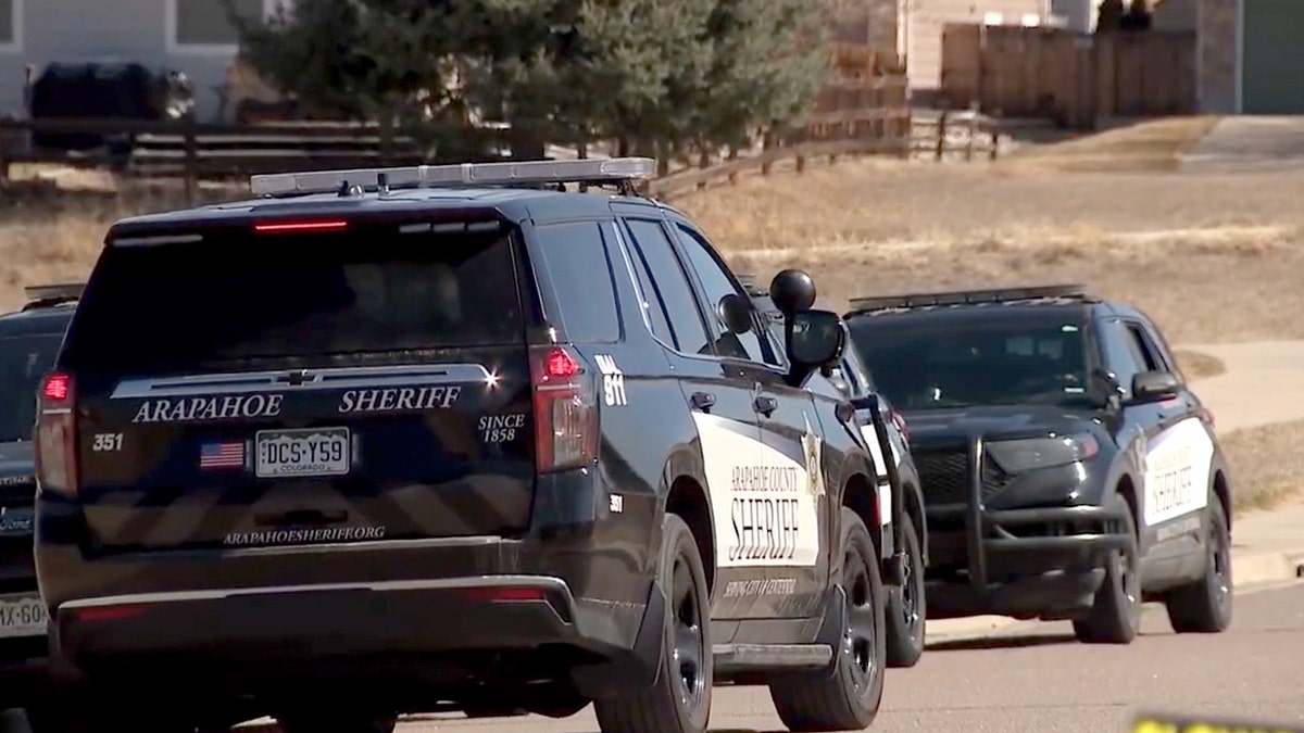 Arapahoe County Sheriff vehicles parked during Centennial child homicide investigation