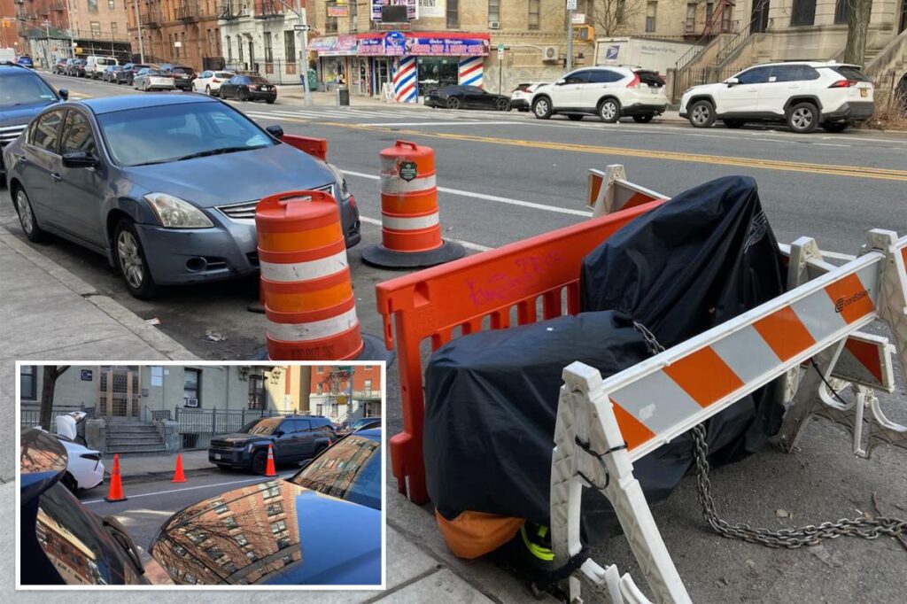 NYC parking wars has drivers saving parking spots with cones, Con Ed barriers and even derelict e-bikes NYC parking wars has drivers saving parking spots with cones, Con Ed barriers and even derelict e-bikes