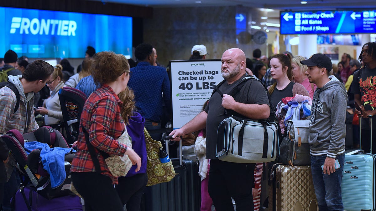Enraged airline passenger unleashes unruly tirade