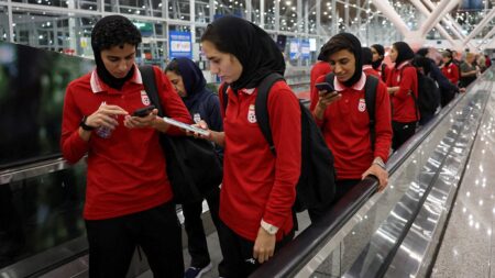 Australian official touts bravery of Iranian women’s soccer team as some receive asylum