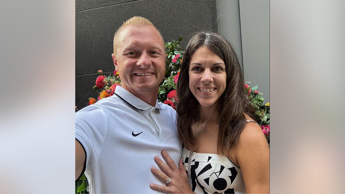 Jason and Laura Hughes smiling in an undated selfie.