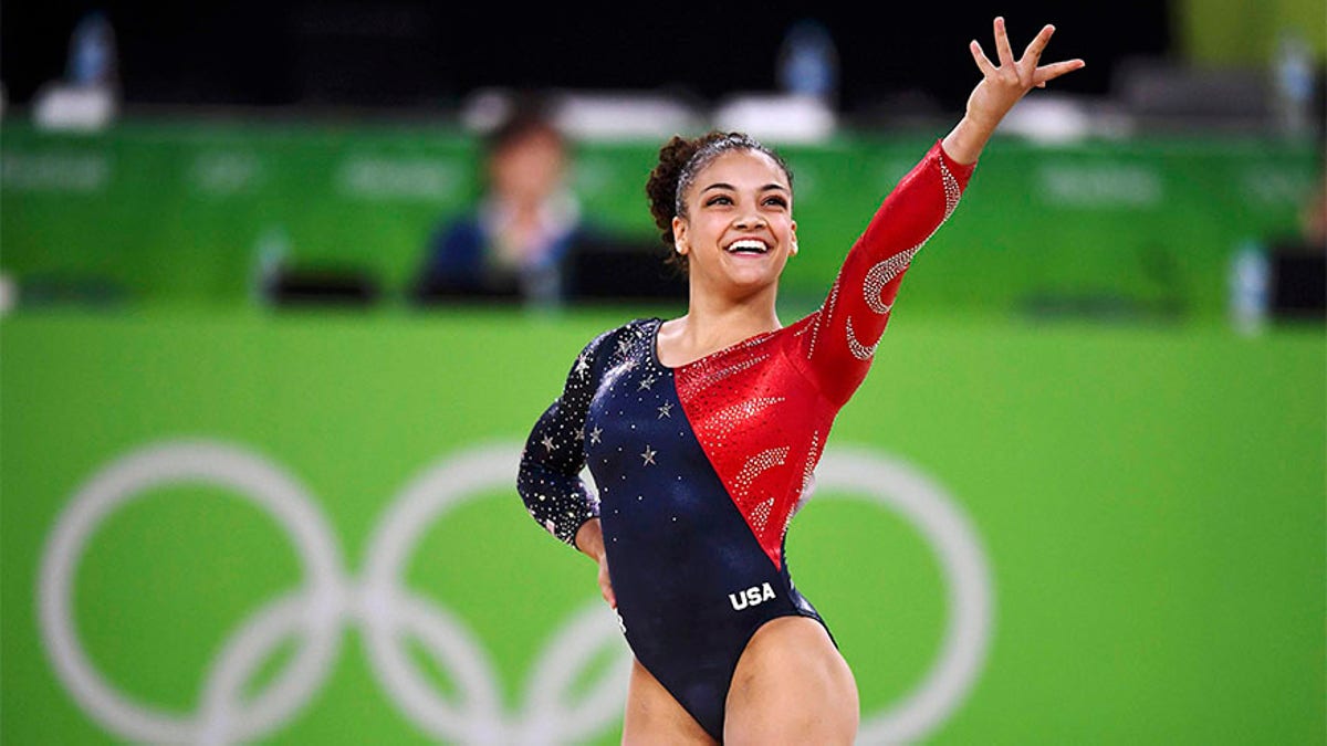 2016 Rio Olympics - Artistic Gymnastics - Preliminary - Women's Qualification - Subdivisions - Rio Olympic Arena - Rio de Janeiro, Brazil - 07/08/2016. Laurie Hernandez (USA) of USA competes on the floor during the women's qualifications. REUTERS/Dylan Martinez FOR EDITORIAL USE ONLY. NOT FOR SALE FOR MARKETING OR ADVERTISING CAMPAIGNS. - RTSLNQ5
