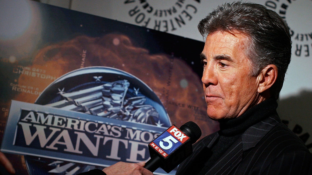 Josh Walsh of "America's Most Wanted" being interviewed.