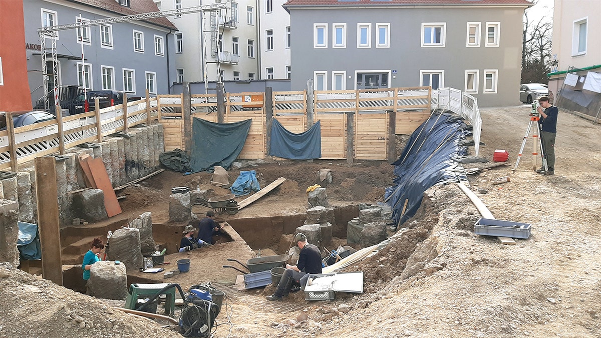 Archaeologists working at site