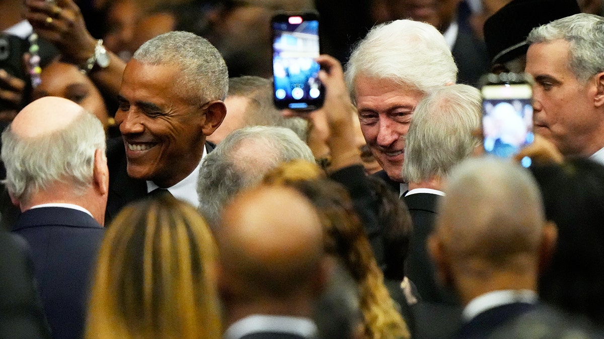 Barack Obama and Bill Clinton arrive at Jesse Jackson memorial service