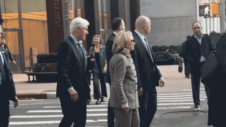 Hillary Clinton caught on video stepping back after pushy former president nudges her at busy NYC intersection