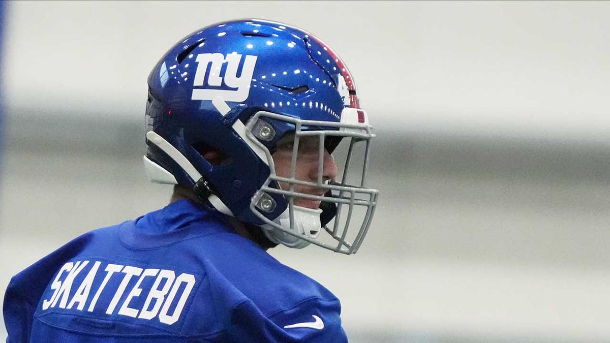 Cam Skattebo looks on