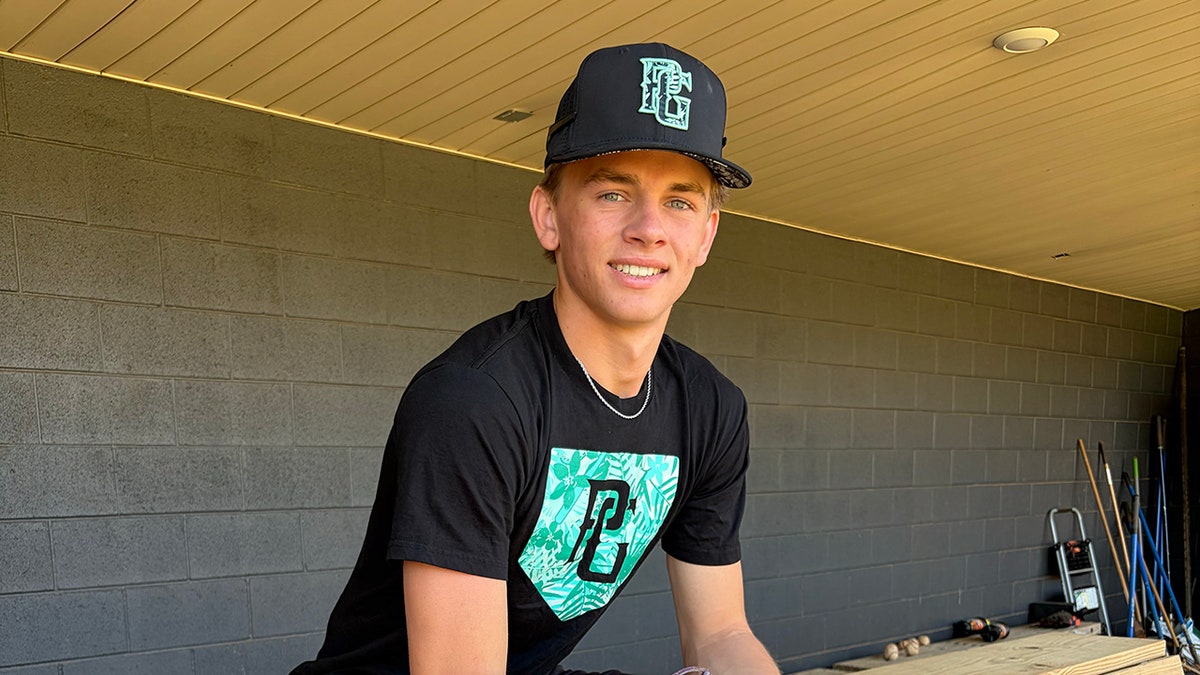 Chase Utley looks on
