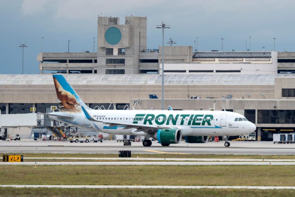Frontier Airlines calls police to enforce  fee after passengers miss flight due to long TSA lines