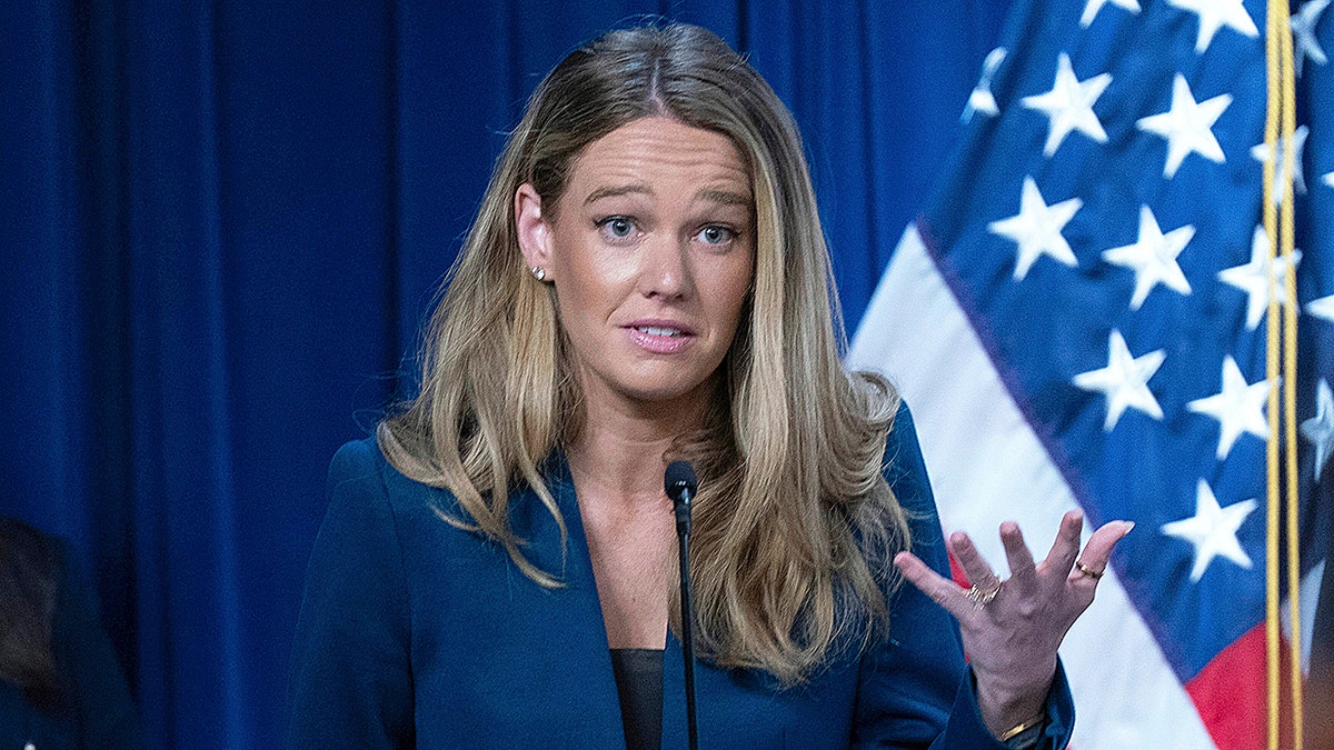 DHS Assistant Secretary for Public Affairs Tricia McLaughlin gestures during press conference