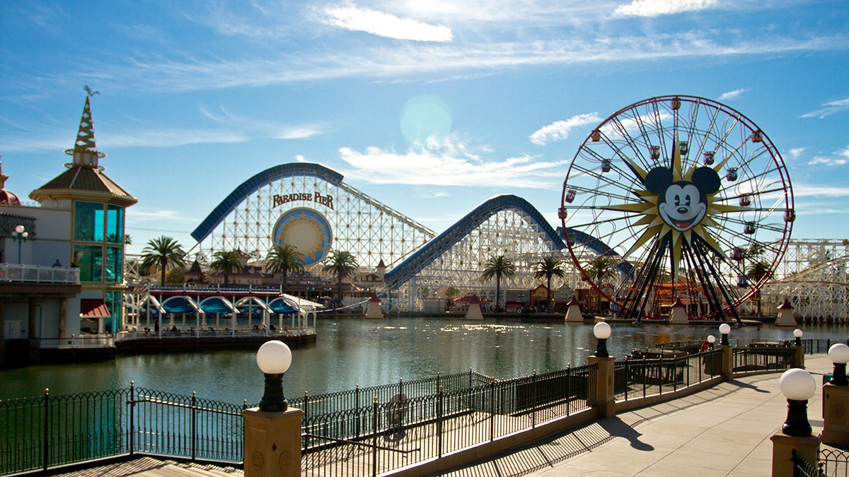 Pixar Pal-A-Round Ferris wheel and Paradise Pier roller coaster at Disney California Adventure in Anaheim, California.