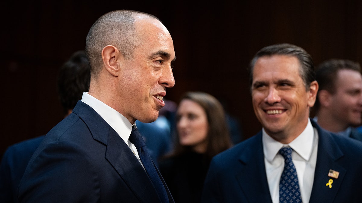 Emil Bove and Todd Blanche speak during a nomination hearing