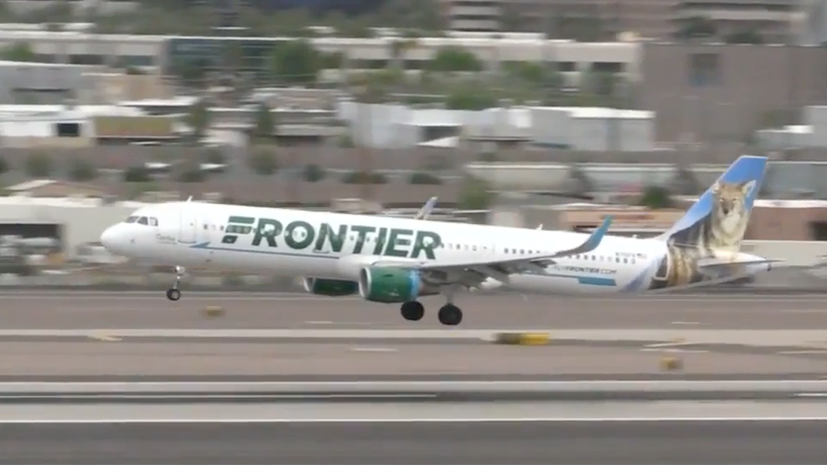 A Frontier plane takes off at the Atlanta airport