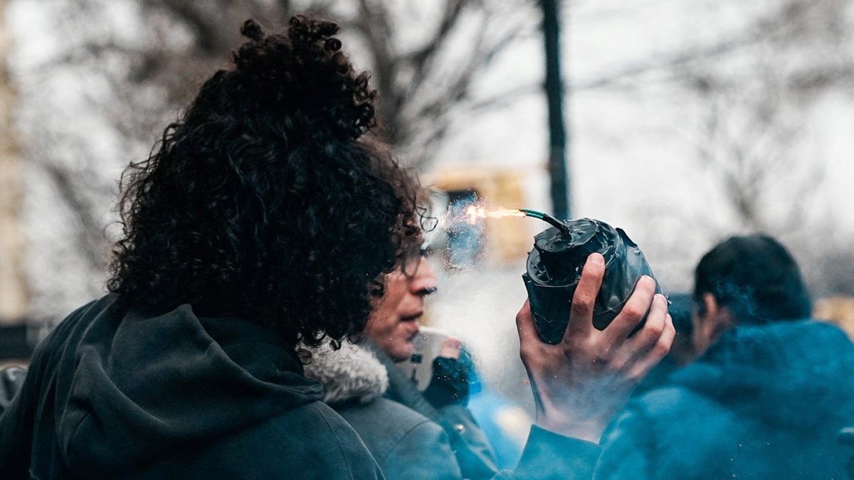 A man with a hand-made explosive device