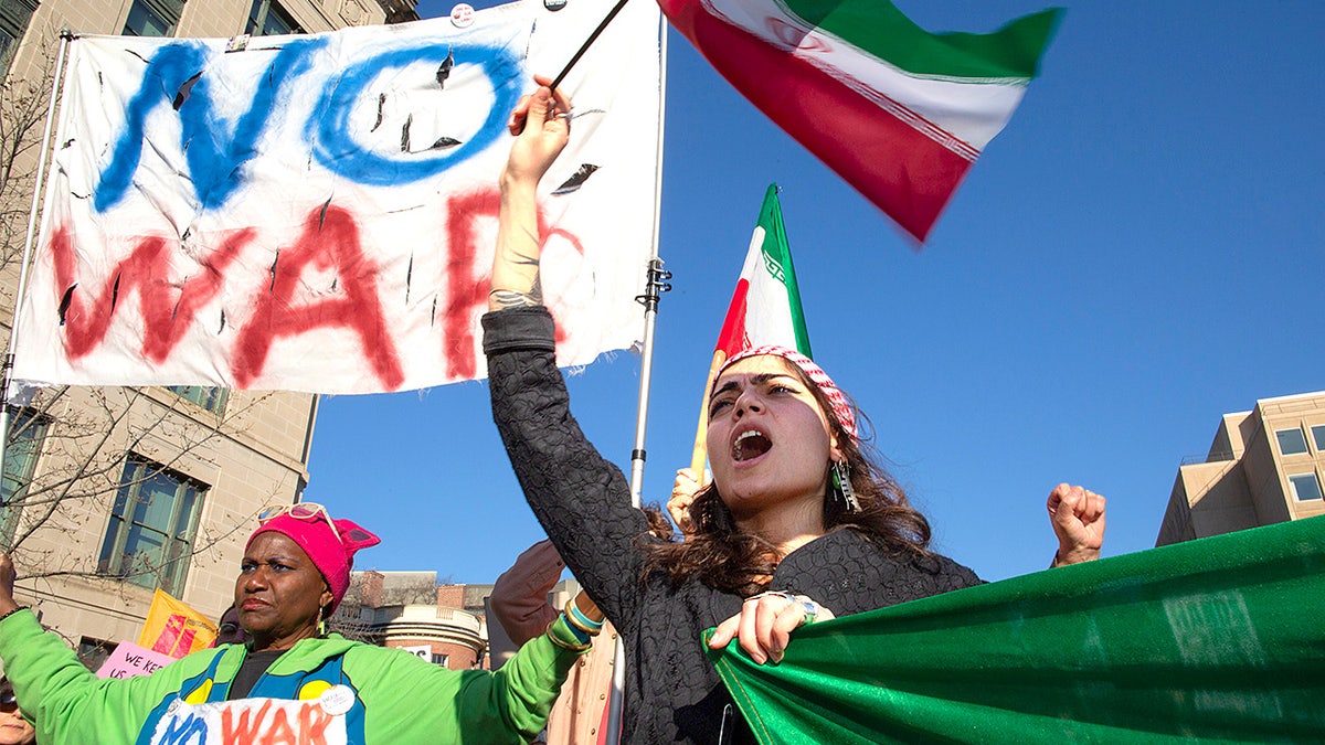 Protester shouts during anti-war rally near White House.