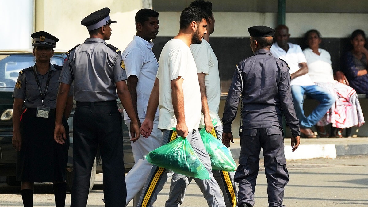 Iranian sailors rescued from IRIS Dena warship walk in Sri Lanka