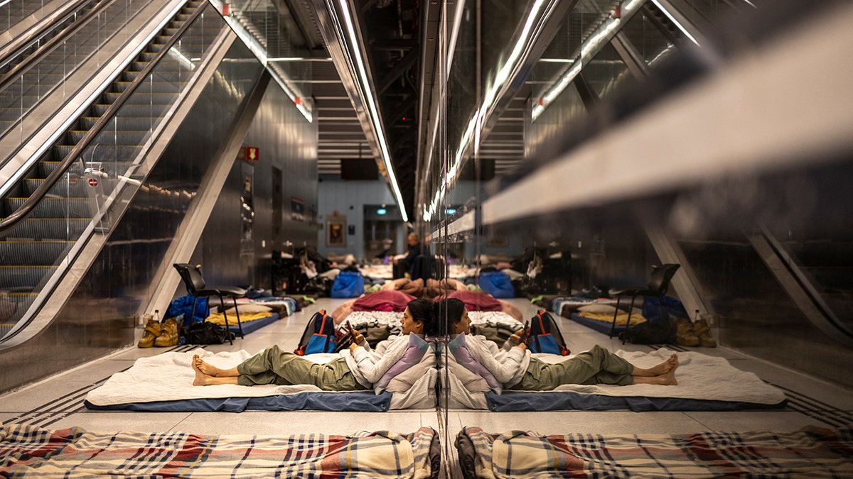 Israelis take shelter in train station