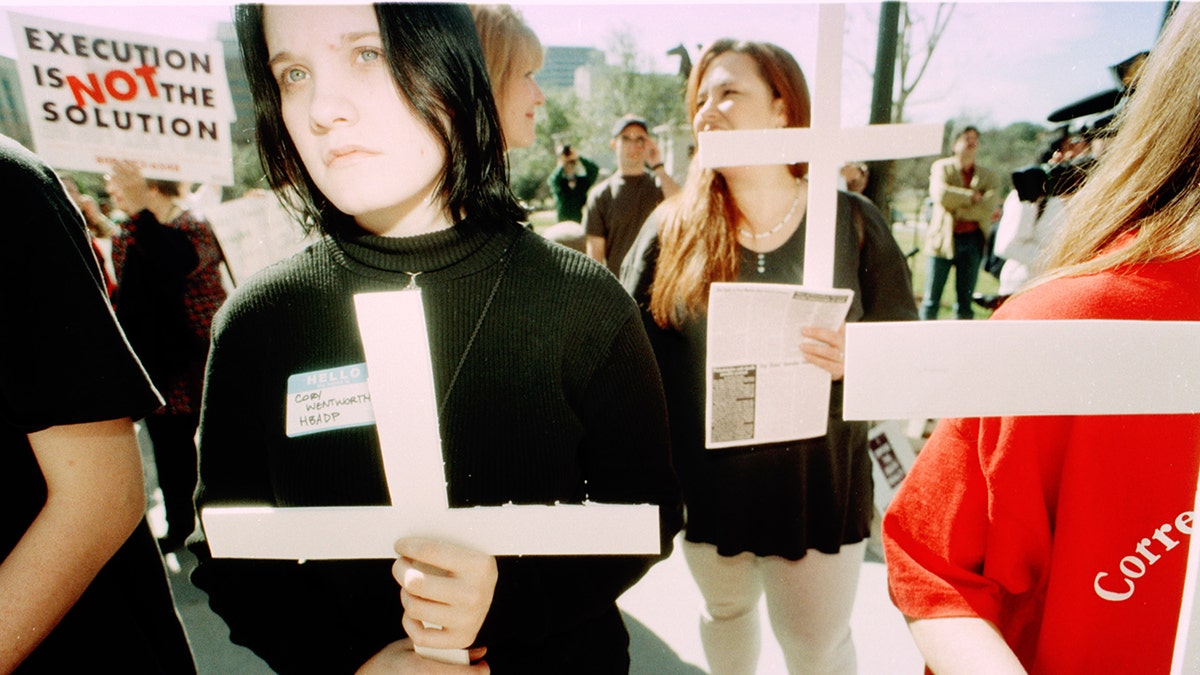 Karla Faye Tucker supporters standing together.