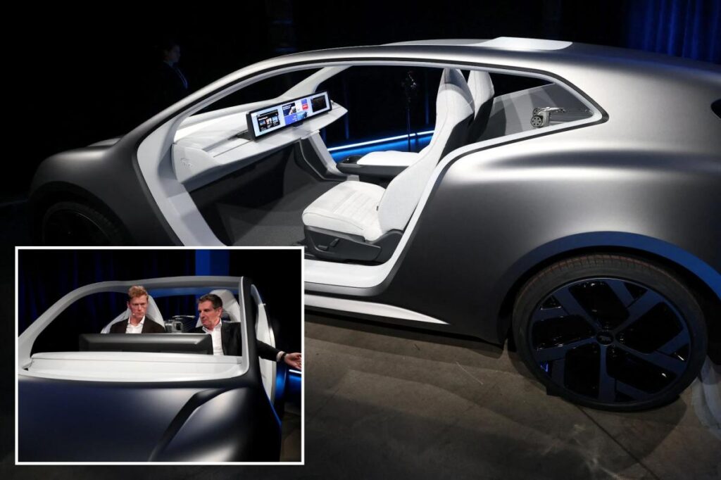 Tesla rival unveils two-seat robotaxi without a steering wheel or pedals