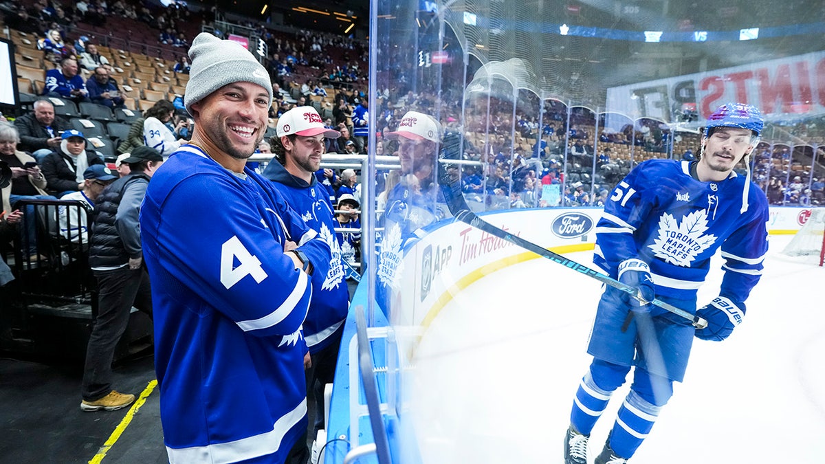 Ernie Clement and George Springer watch