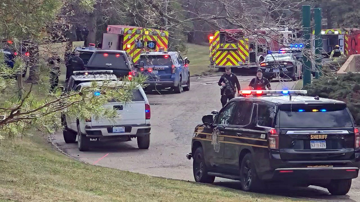 Emergency and police vehicles parked outside the Temple Israel synagogue
