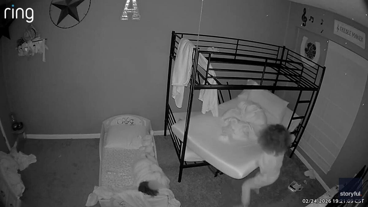 The sister was seen on video attempting to pull the mattress off her brother after the collapse.