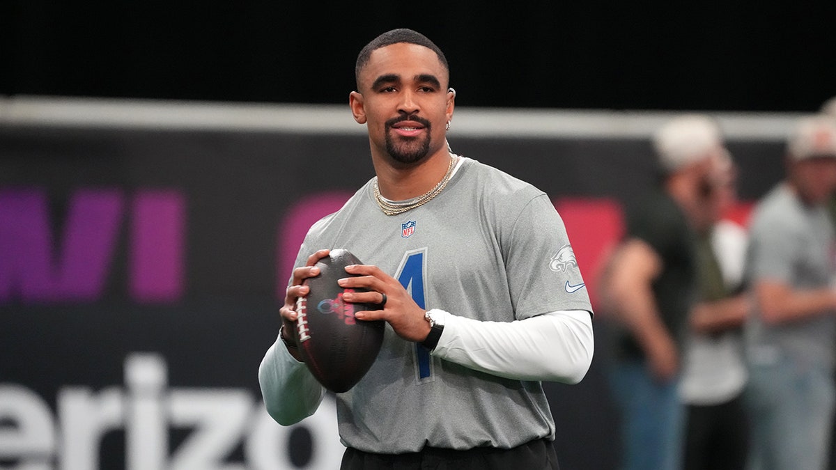 Jalen Hurts warms up for the Pro Bowl event