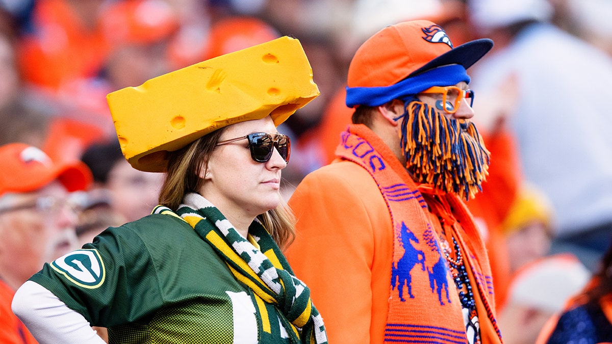 NFL fans look on field